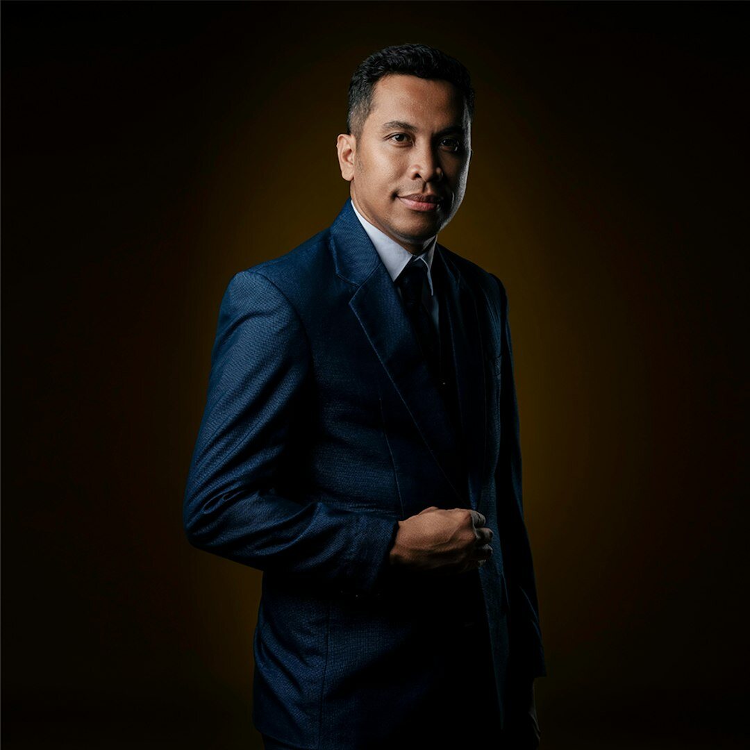 Professional man trainer in suit smiling